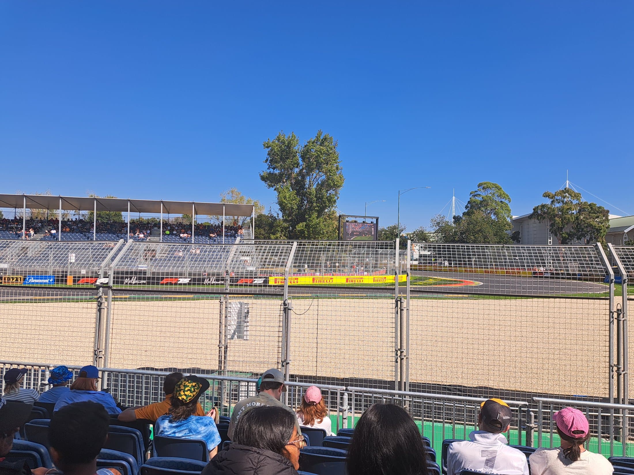 A view of the Albert Park circuit through the catch fencing from the grandstand