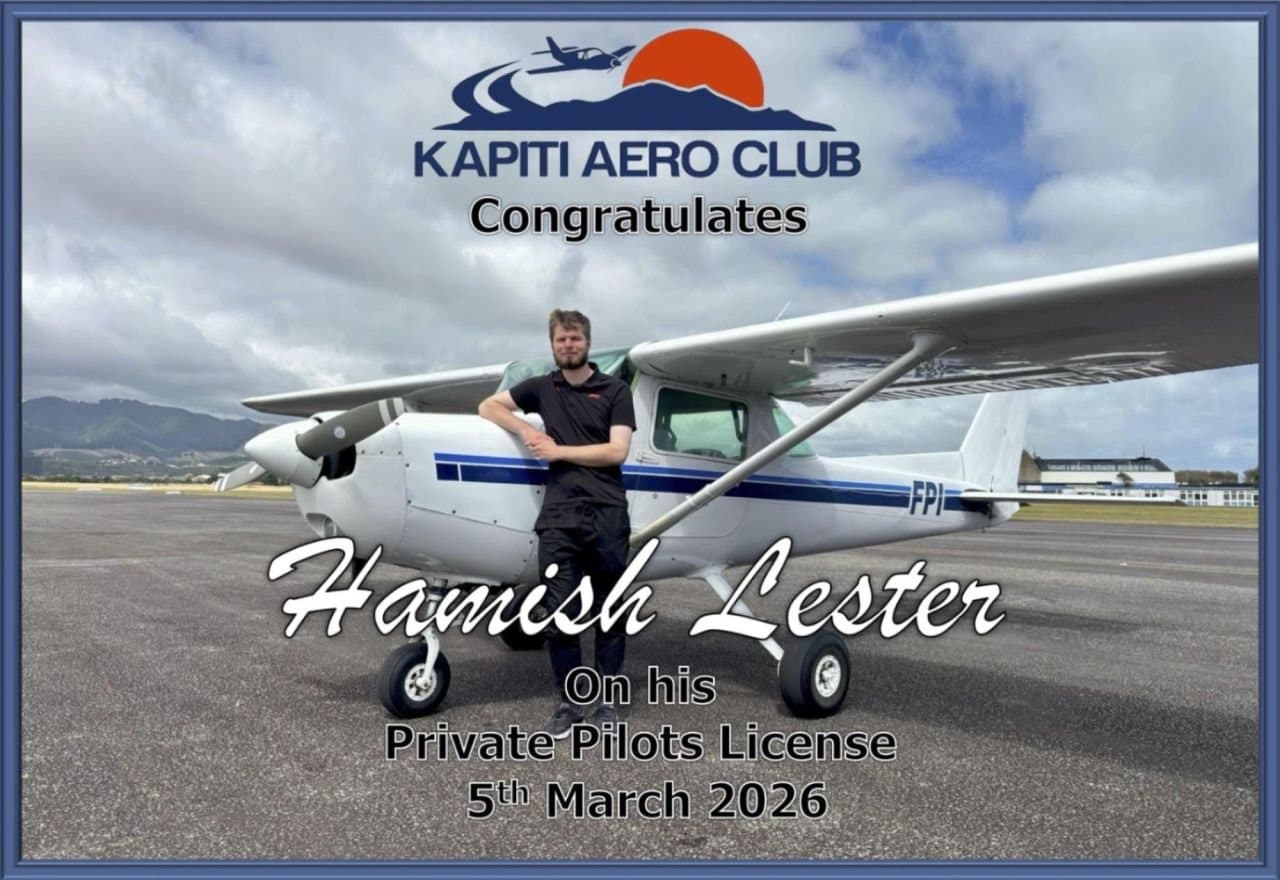 A Kapiti Aero Club congratulations card showing Hamish beside a Cessna 152 on the day he got his Private Pilot Licence